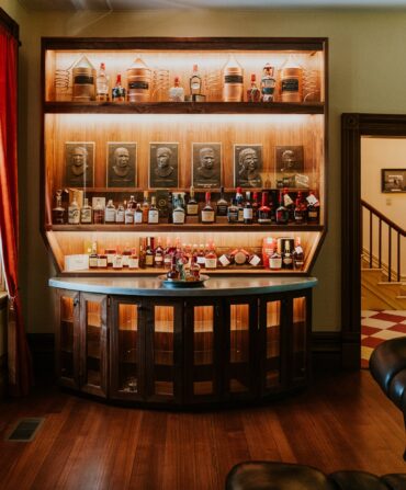 Inside a bourbon museum with shelves of bottles