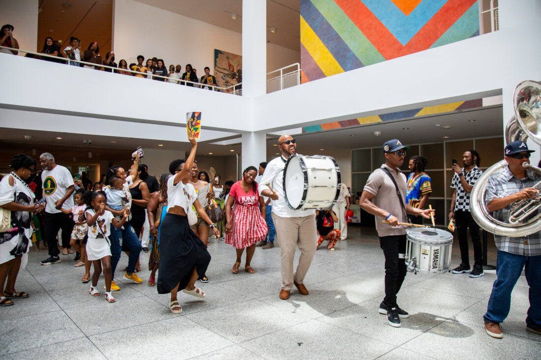 People dancing in a museum