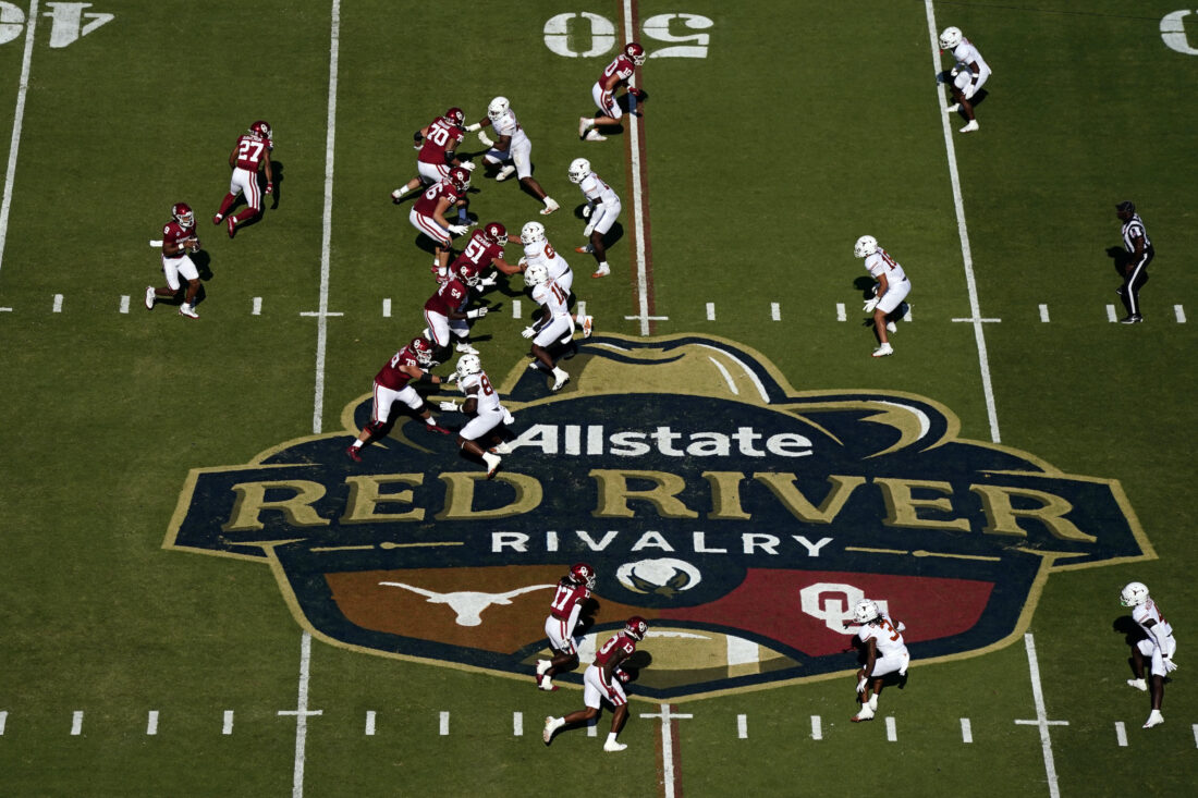 Football players play on a field