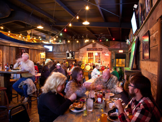 Inside a wood-covered restaurant and juke joint