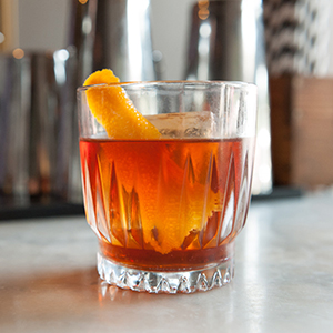 glass of bourbon with ice