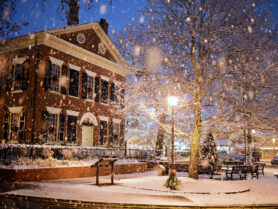 A historic courthouse in the snow