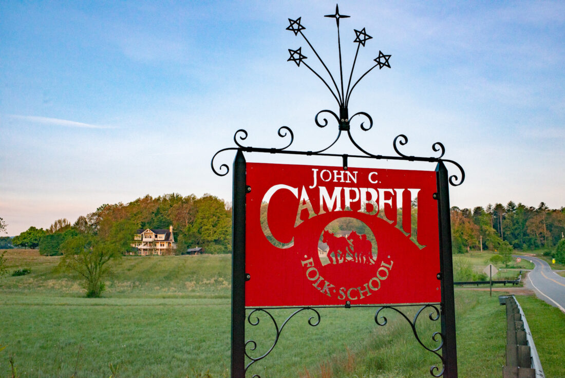 A red sign in a mountain landscape