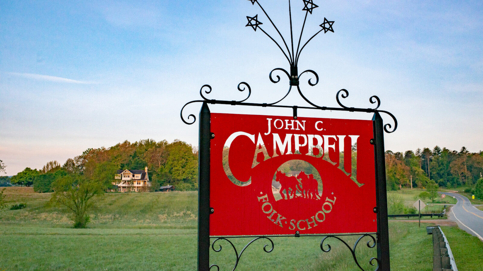 A red sign in a mountain landscape