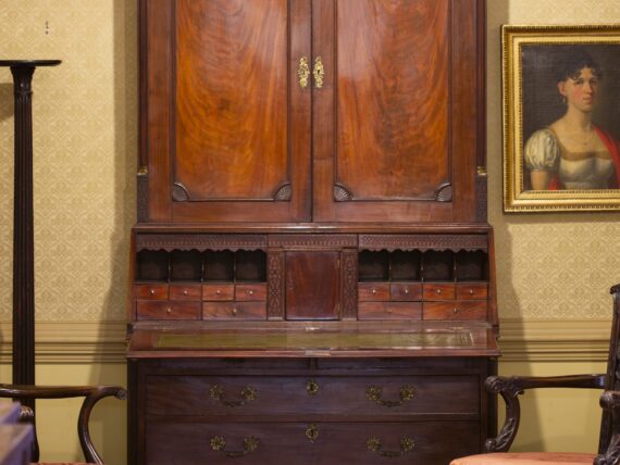 An antique desk and chair