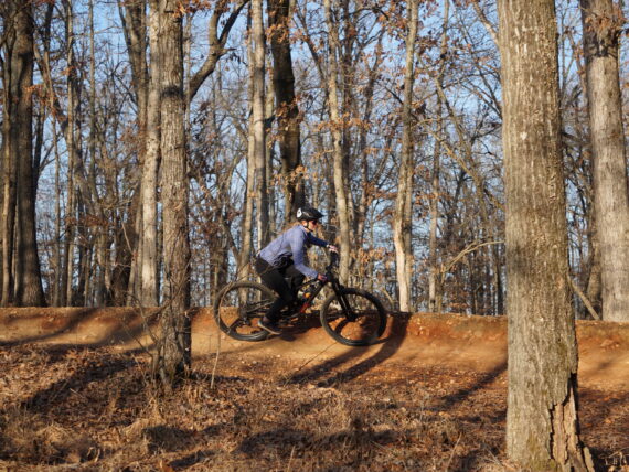 A woman mountain biking