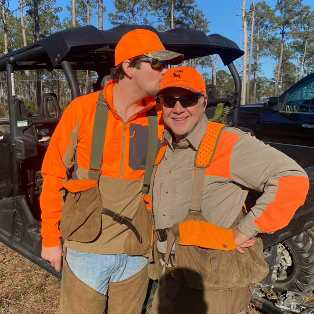 Two men in hunting gear