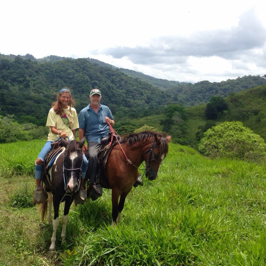 A man and woman on horses