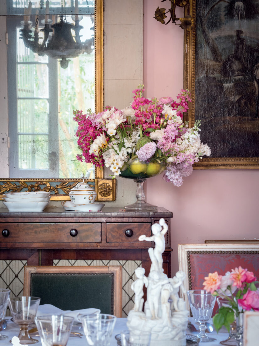 A bouquet of flowers on a mantle