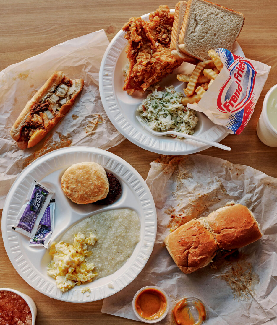 A breakfast plate, fried chicken and sides, a chili dog, and chili burgers.