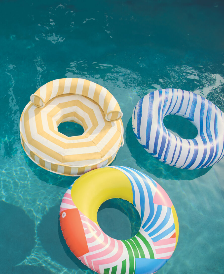 A collection of three pool floats