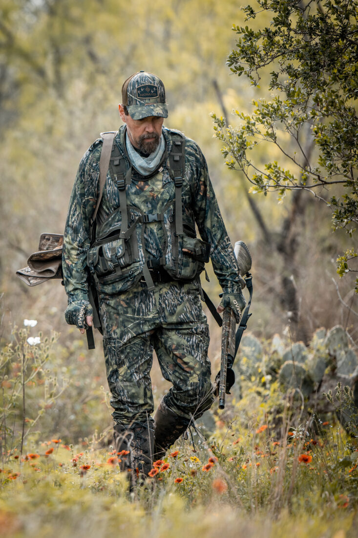 A hunter walking in the field