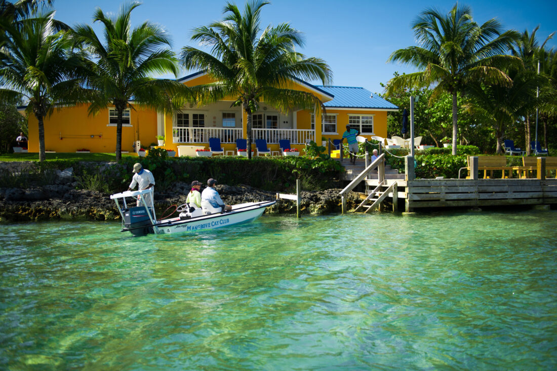 A lodge on green water