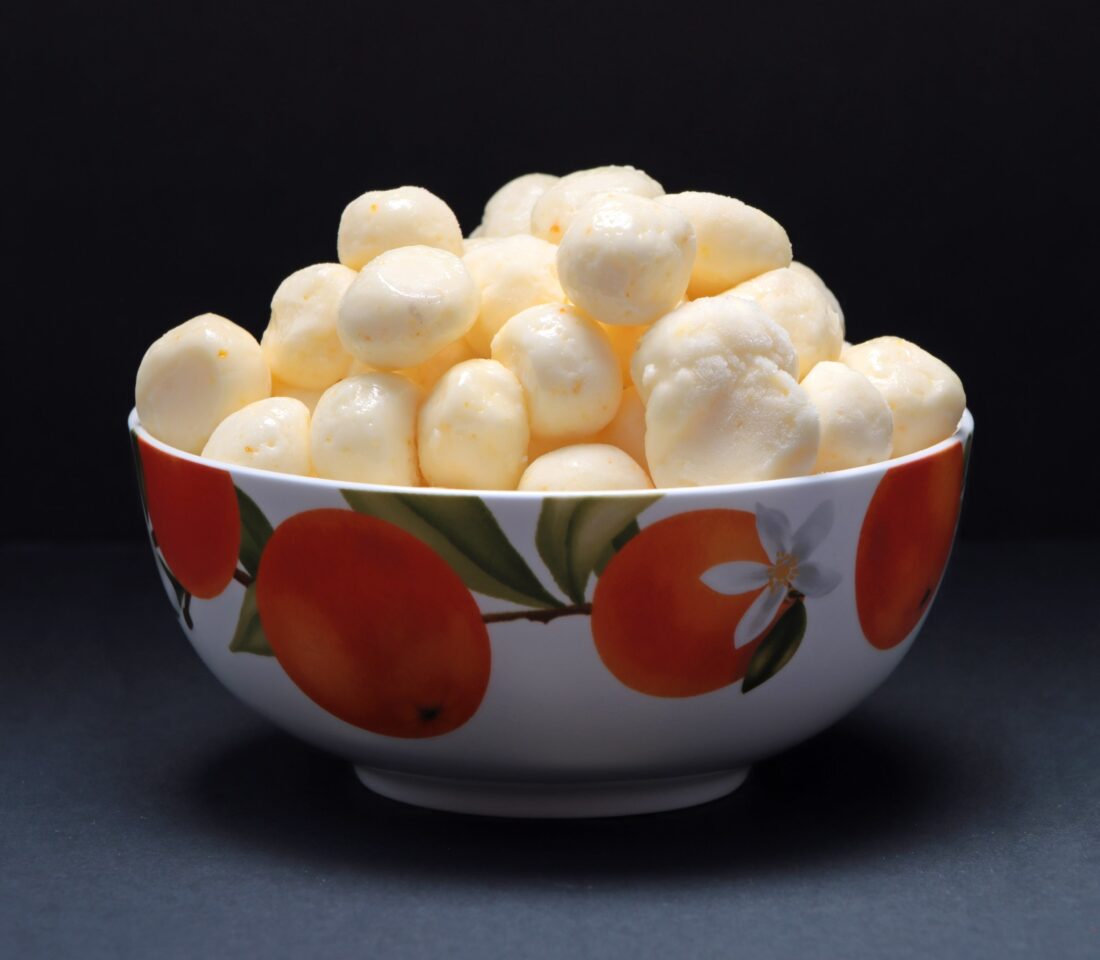 A bowl of orange candy