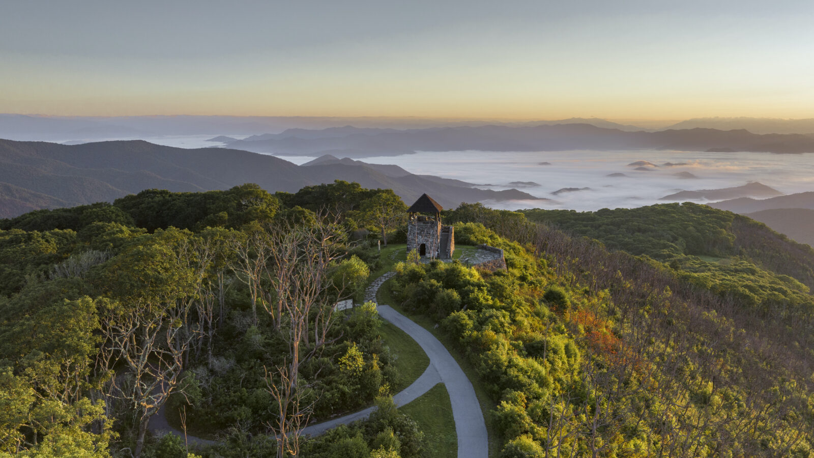 A lookout tower over a mountain landscape