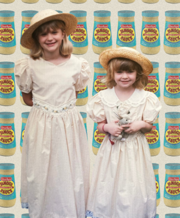 Two girls in dresses and hats in front of a pattern of sauce jars